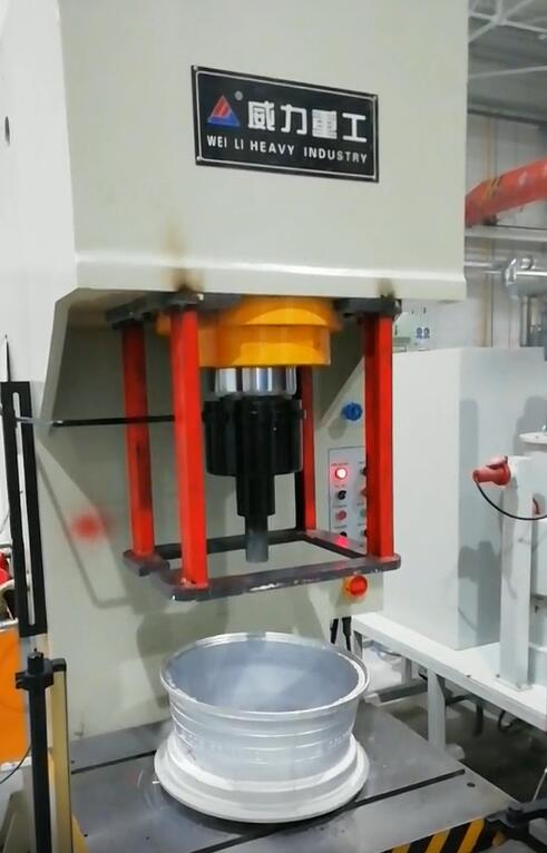 汽車(chē)輪轂沖孔用100噸液壓沖床